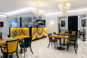 Restauracja lub miejsce do jedzenia w obiekcie Hotel Maria