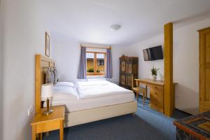 Posteľ alebo postele v izbe v ubytovaní Hotel Hvezda