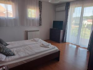 Postel nebo postele na pokoji v ubytování Casa Eric