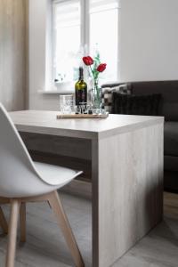 Posedenie v ubytovaní Apartament Łąkowa 2 + 7 fotografií