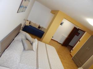 a bedroom with a large bed in a room at Casa vacanza Grace in Ravello +42 photos