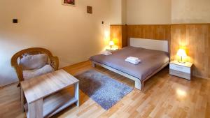 Posteľ alebo postele v izbe v ubytovaní Afrodité Apartmanok