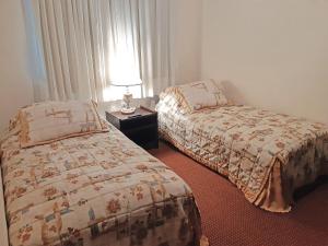 Postel nebo postele na pokoji v ubytování Hotel Stelter