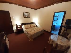 Ein Bett oder Betten in einem Zimmer der Unterkunft Hotel Stelter
