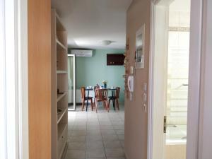 A television and/or entertainment centre at Sior Dionysios Apartments