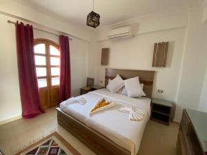 Cama ou camas em um quarto em Villa 22