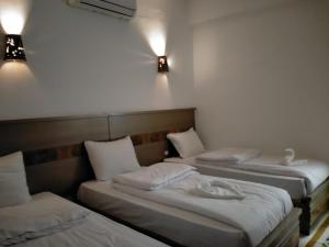Cama ou camas em um quarto em Villa 22