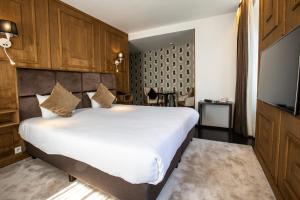 Кровать или кровати в номере Hotel Esperance