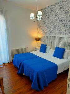 Posteľ alebo postele v izbe v ubytovaní Casa castro + 23 fotografií