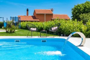 Bazén v ubytovaní Villa Bella Vita alebo v jeho blízkosti