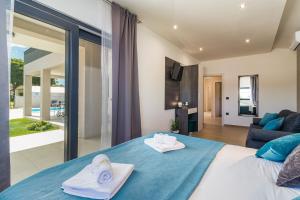 Posteľ alebo postele v izbe v ubytovaní Villa Bella Vita
