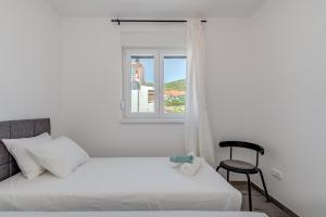 Postel nebo postele na pokoji v ubytování New and chic place near Old Town of Trogir