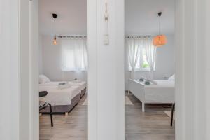 Postel nebo postele na pokoji v ubytování New and chic place near Old Town of Trogir