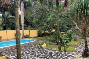 Acogedora Casa Rural en plena naturaleza frente al Río con piscina Bonao 내부 또는 인근 수영장