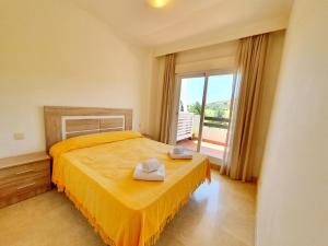 En eller flere senge i et værelse på Casa Laarne + 20 billeder