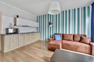 Kuchnia lub aneks kuchenny w obiekcie Grand Apartments - Szafuza Apartment Gdańsk Szafarnia