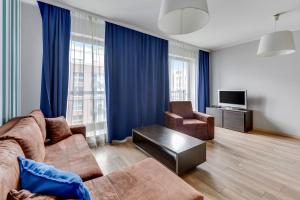 Telewizja i/lub zestaw kina domowego w obiekcie Grand Apartments - Szafuza Apartment Gdańsk Szafarnia