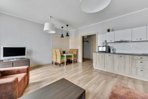 Kuchnia lub aneks kuchenny w obiekcie Grand Apartments - Szafuza Apartment Gdańsk Szafarnia