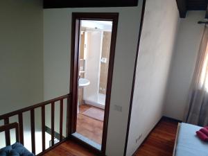 A bed or beds in a room at Oxy Holiday Home
