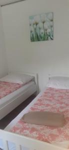 Postel nebo postele na pokoji v ubytování Apartman Sara vl. Franjo Klasić