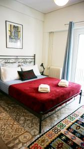 Postel nebo postele na pokoji v ubytování A few steps away from Syntagma and Plaka by Athenian Homes