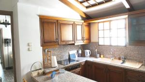 Kuchyň nebo kuchyňský kout v ubytování A few steps away from Syntagma and Plaka by Athenian Homes + 34 fotografií