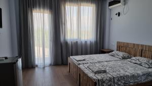 Llit o llits en una habitació de French Hotel