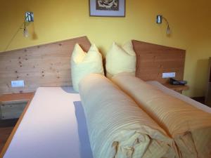 Letto o letti in una camera di Alpenecho