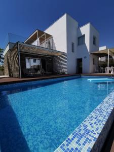 The swimming pool at or near Luxury new villa Poseidon