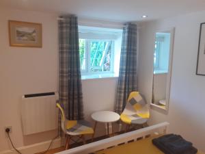 Istumisnurk majutusasutuses THE BOTHY SUITE BY TEMPLE WOOD