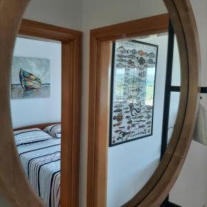 Postel nebo postele na pokoji v ubytování APARTMAN KAVALA