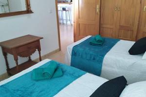Posteľ alebo postele v izbe v ubytovaní Apartamento ALAZÁN,Cerca de la PLAYA