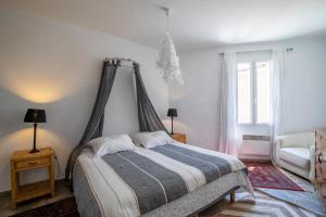 En eller flere senger på et rom på Maison Ventoux 2 Luxe Calme Central Linge fourni