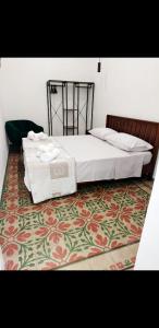 A bed or beds in a room at Loft Marettimo Egadi