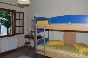 A bed or beds in a room at Pantheon