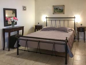 A bed or beds in a room at Pantheon