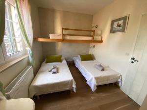 Postel nebo postele na pokoji v ubytování Apartments Serenity