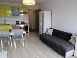 Posezení v ubytování Falla Apartment Gdańsk