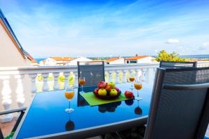 Balkón alebo terasa v ubytovaní Apartment in Stinjan with sea view, terrace, air conditioning, WiFi 5018-1