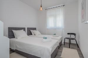 Postel nebo postele na pokoji v ubytování New and chic place near Old Town of Trogir