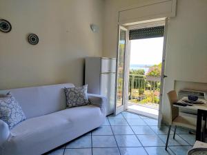 A seating area at REale Apartments