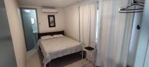 Een bed of bedden in een kamer bij DK3 - CaSA COM 3 SUITES COM PISCINA BRUNO KLEMTZ