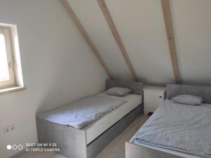 Postel nebo postele na pokoji v ubytování Panorama, Balaton