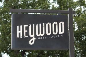 a sign for a hollywood sqor sqorsenalsenalsenalsenalsenalsenalsenalsenal at Heywood Hotel in Austin