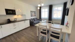 Kuchyň nebo kuchyňský kout v ubytování R&J apartmány