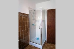 a shower with a glass door in a bathroom at Maison entière la longe'yeres in Saint-Martin-le-Gaillard +49 photos