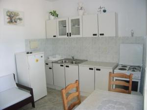 Kuchnia lub aneks kuchenny w obiekcie House Lumbarda (876)
