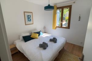 Кровать или кровати в номере LA BOHÊME by K6 Conciergerie Villas