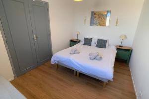 Кровать или кровати в номере LA BOHÊME by K6 Conciergerie Villas