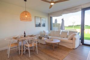 A seating area at OCEANSUITESLANGRE